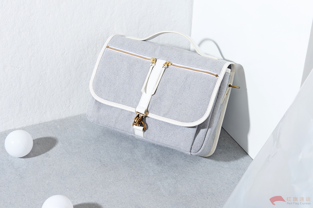 16397994394019.jpg 摄图网_500990327_包包女士男士手提包钱包斜挎包背包(企业商用)_副本.jpg